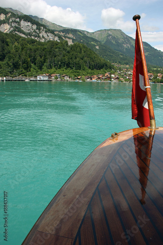 Swiss flag at luxury wooden boat