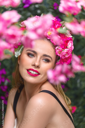 Beautiful woman with flowers wreath