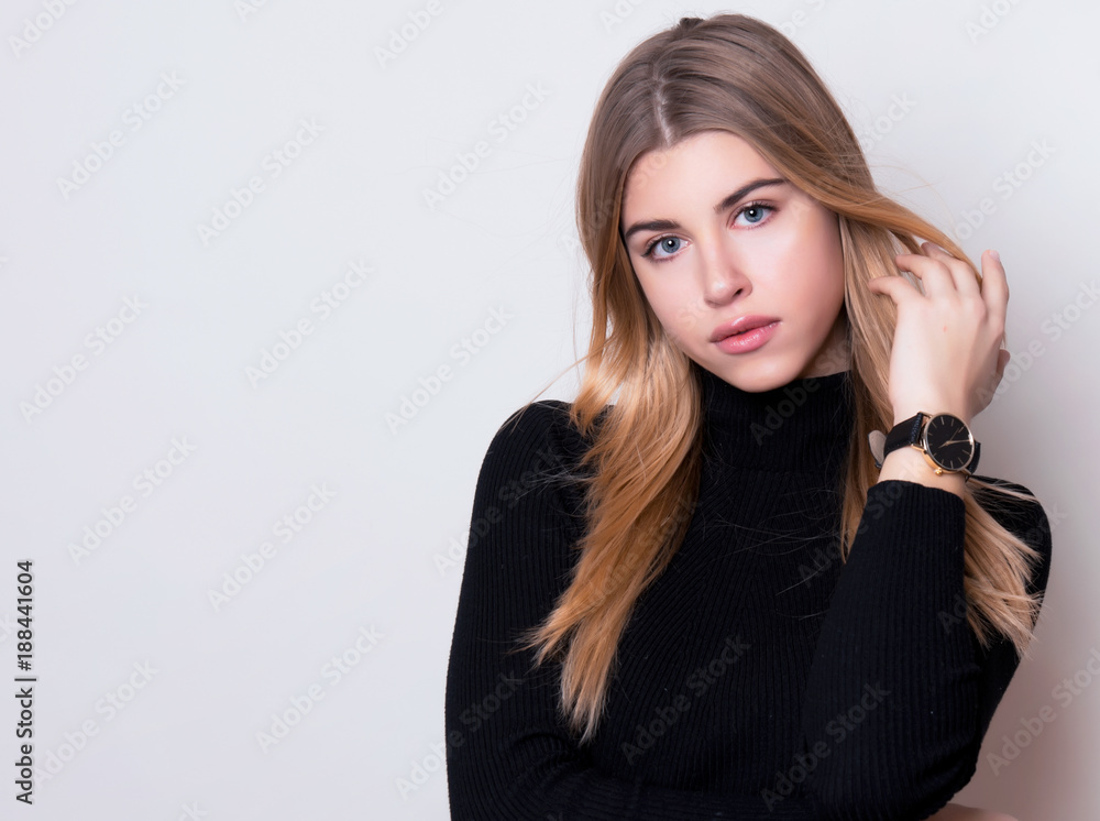 beautiful young woman with long hair wearing wrist watch beautiful young woman with long hair wearing wrist watch