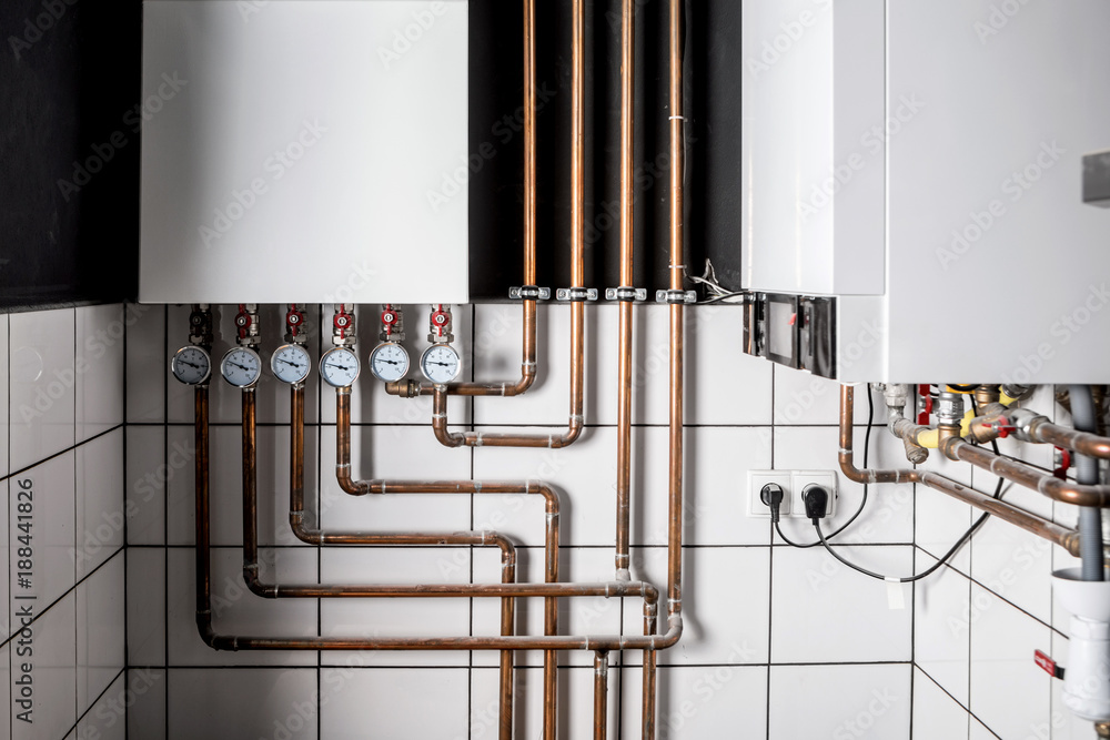 plumber fixing central heating system