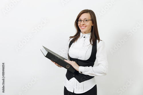 Beautiful happy caucasian young smiling brown-hair business woman in black suit, white shirt and glasses with folder with working documents isolated on white background. Copy space for advertisement.