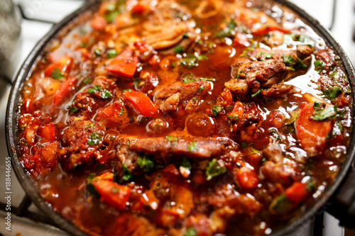 Chakhokhbili. Chicken with herbs and tomato.