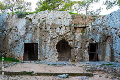 Prison of philosopher Socrates in Athens Greece. It is located on the eastern side of Philopappos hill where there are two caves carved into the rock. 