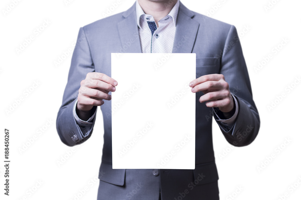 Businessman in grey suit holding blank paper on white background. Businessman in grey suit holding blank paper on white background.