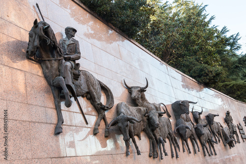 Wall statuee 'Run of Bulls' at the Plaza de Toros de Las Ventas in front of bullring in Madrid , Spain. photo