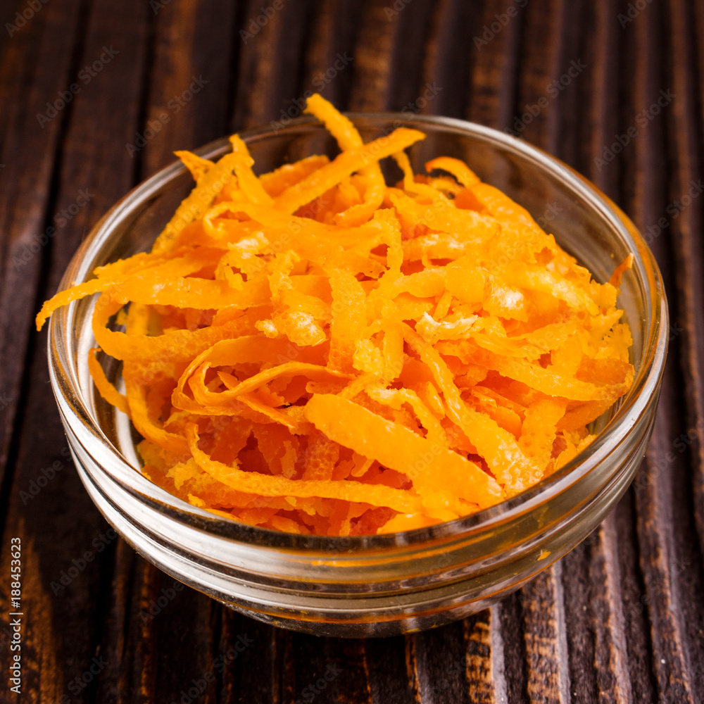 oranges and juice on a wooden background