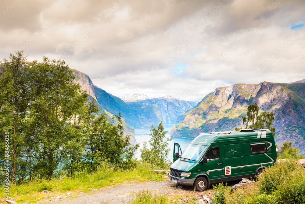 Naklejka premium Camper car in norwegian mountains
