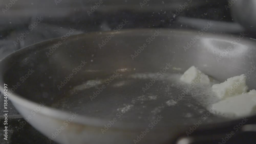 Breaded chicken placed on pan, close up Breaded chicken placed on pan, close up