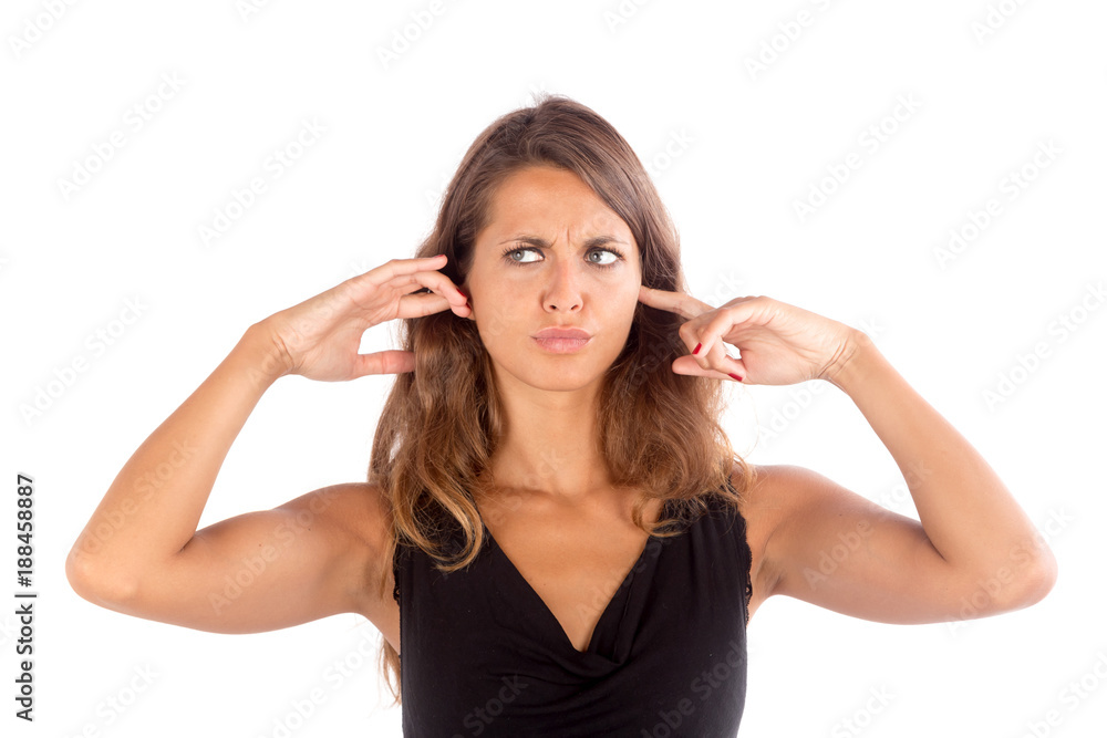 Beautiful girl with her hands covering her ears; isolated photo with copy space Beautiful girl with her hands covering her ears; isolated photo with copy space