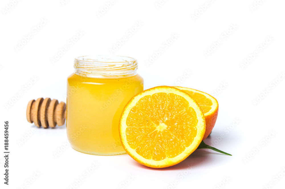 Jar of honey and orange isolated on white background Jar of honey and orange isolated on white background