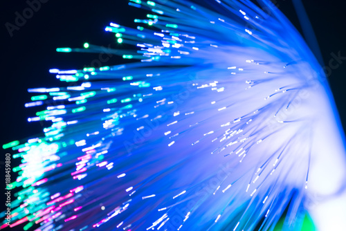 abstract blurred fiber optic light for network or technology background