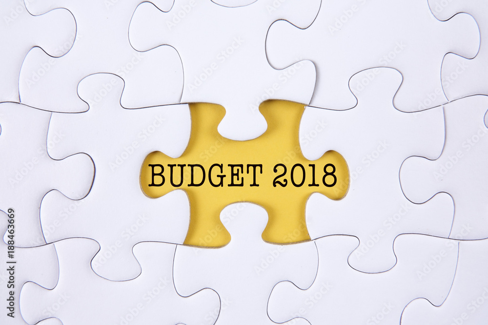 Business concept: Missing jigsaw puzzle with word BUDGET 2018. Business concept: Missing jigsaw puzzle with word BUDGET 2018.