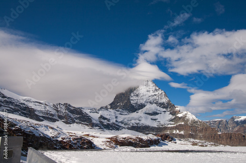 Winter panorama of mount Matterhorn covered with clouds  Canton of Valais  Alps  Switzerland 