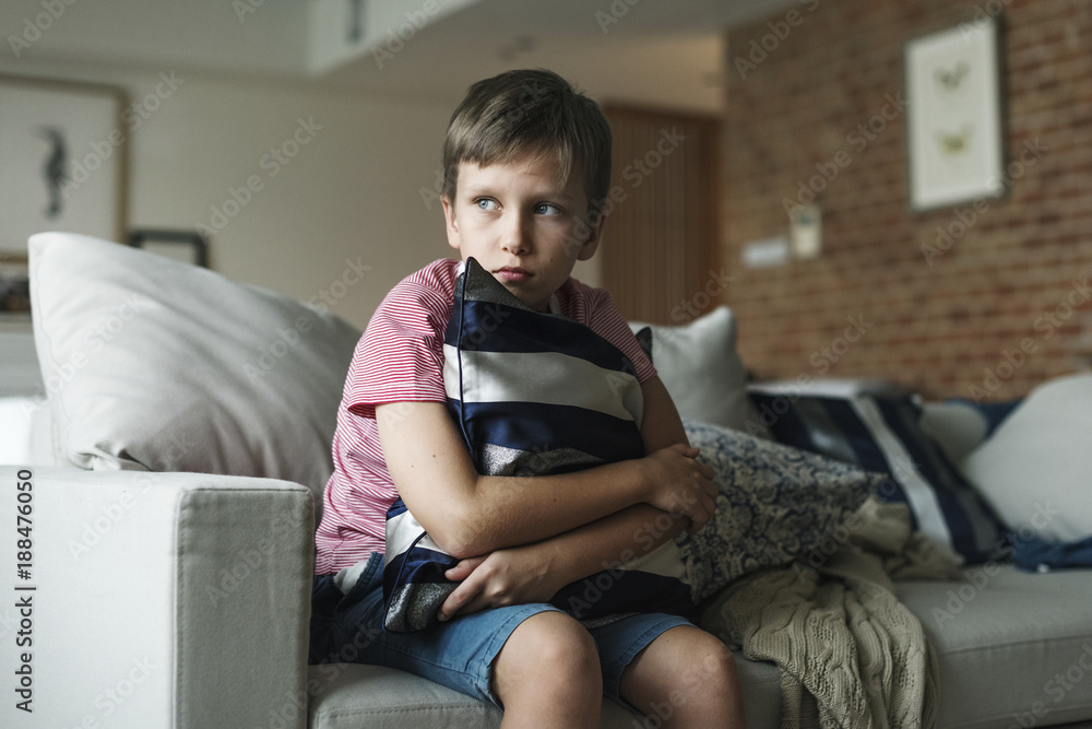 Young Caucasian boy with stressed emotion Young Caucasian boy with stressed emotion