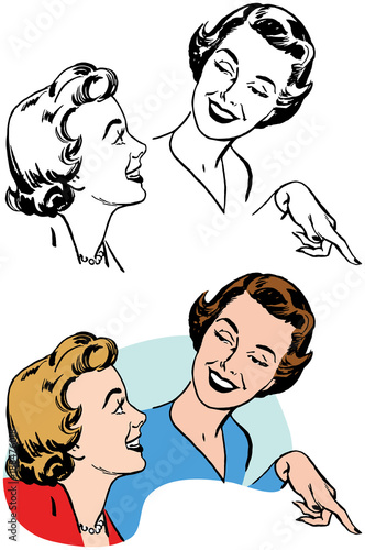Two woman smiling talking and pointing.