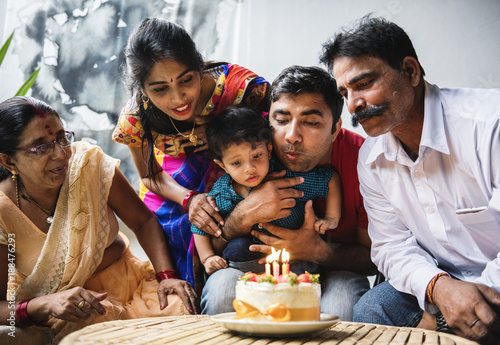 Obraz na plátně Indian family celebrating a birthday party