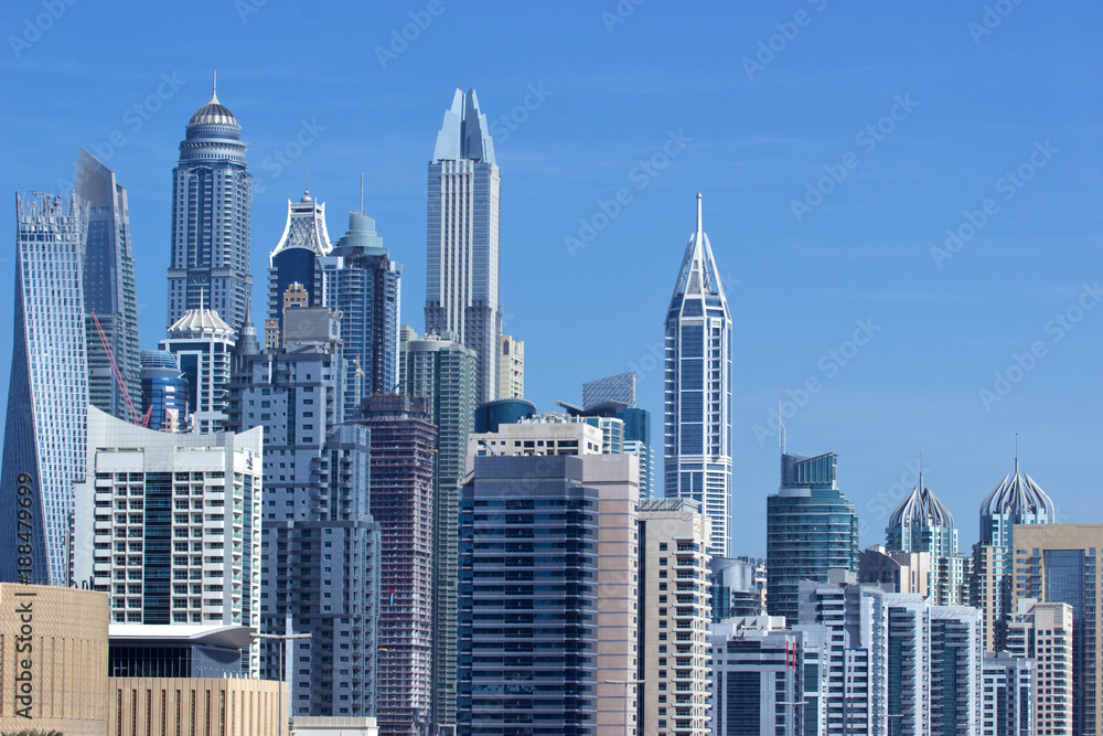 Dubai Marina skyline. Dubai luxury district. Dubai skyscrapers. Dubai cityscape views. Dubai futuristic city. 
