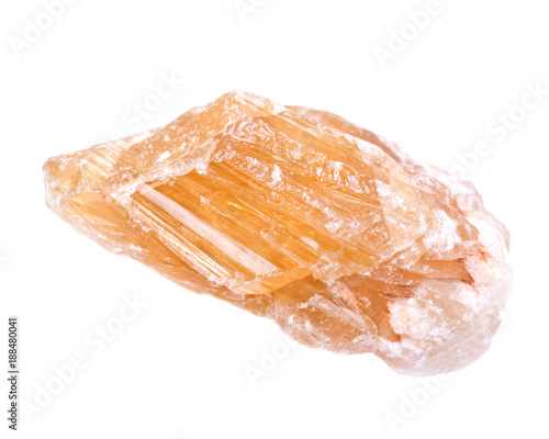 Partially crystallized golden Scapolite from Nigeria isolated on white background 