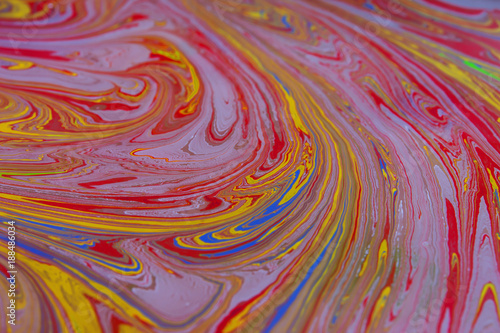 Colorful psychedelic background made of interweaving curved shapes. Marbling Acrylic Paint 