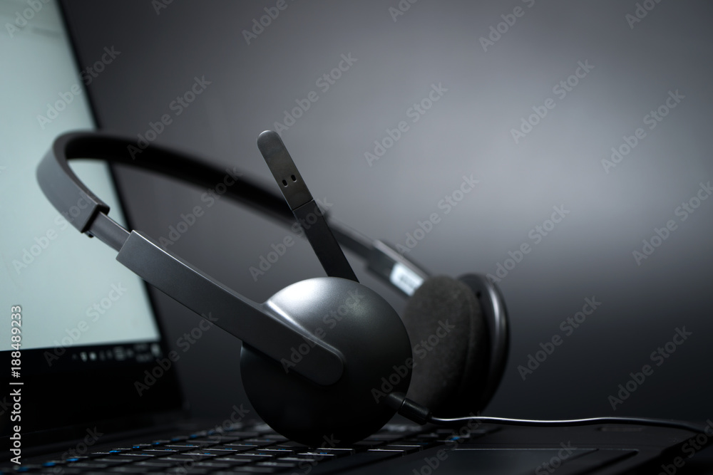 Headset on a laptop computer Headset on a laptop computer