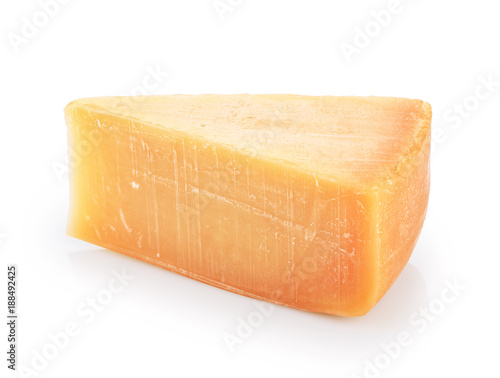 Piece of parmesan cheese isolated on white background.