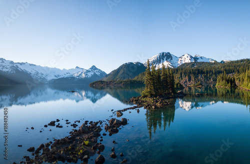Aerial panoramic view of a beautiful glacier lake in Canadian Mountain Landscape. Taken in Garibaldi, near Squamish and Whistler, North of Vancouver, BC, Canada. 
