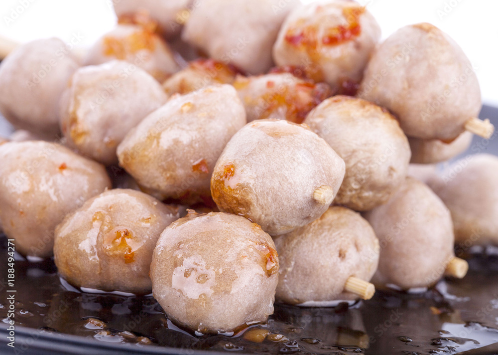 Grilled meat ball with sweet spicy sauce isolated on white. Grilled meat ball with sweet spicy sauce isolated on white.