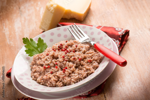 Принти на полотні risotto with red wine red pepper and parmesan cheese, selective focus