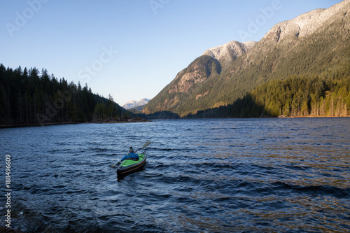 Girl Kayaking in a Lake. Taken in Buntzen Lake, Vancouver, British Columbia, Canada.