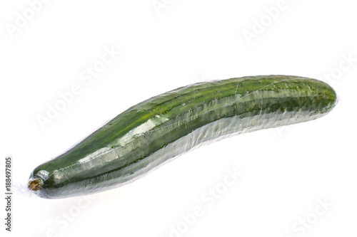 Fresh cucumber in package on white background