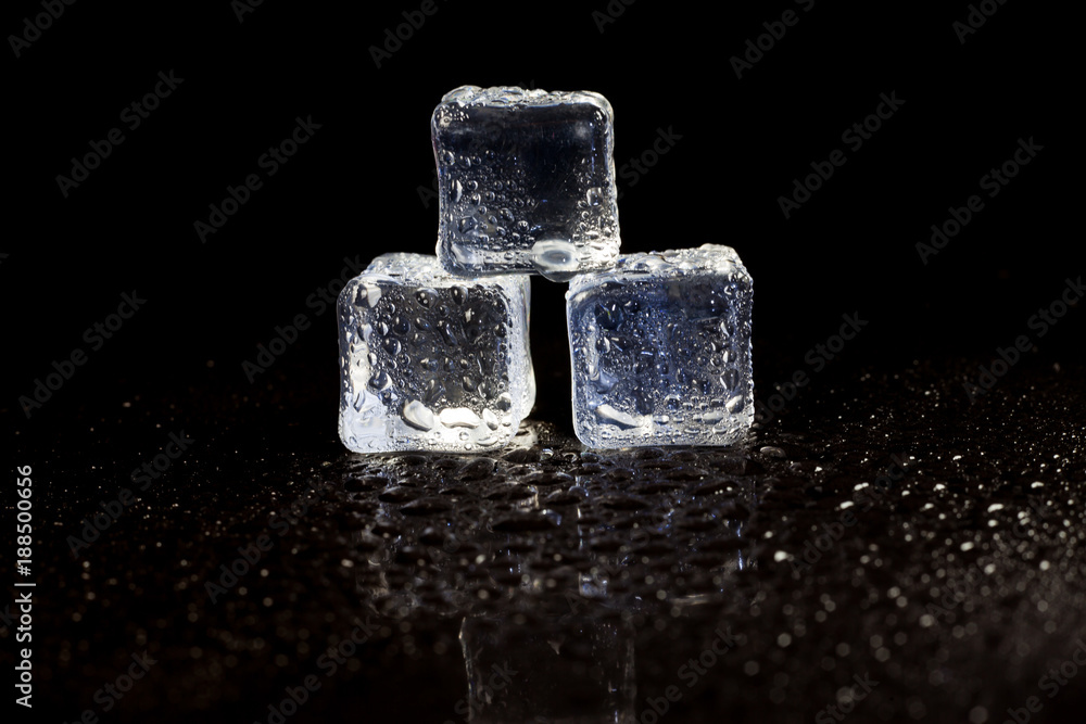 ice cubes on black background. ice cubes on black background.