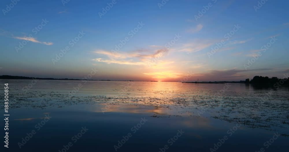 Woman at the pier by the river