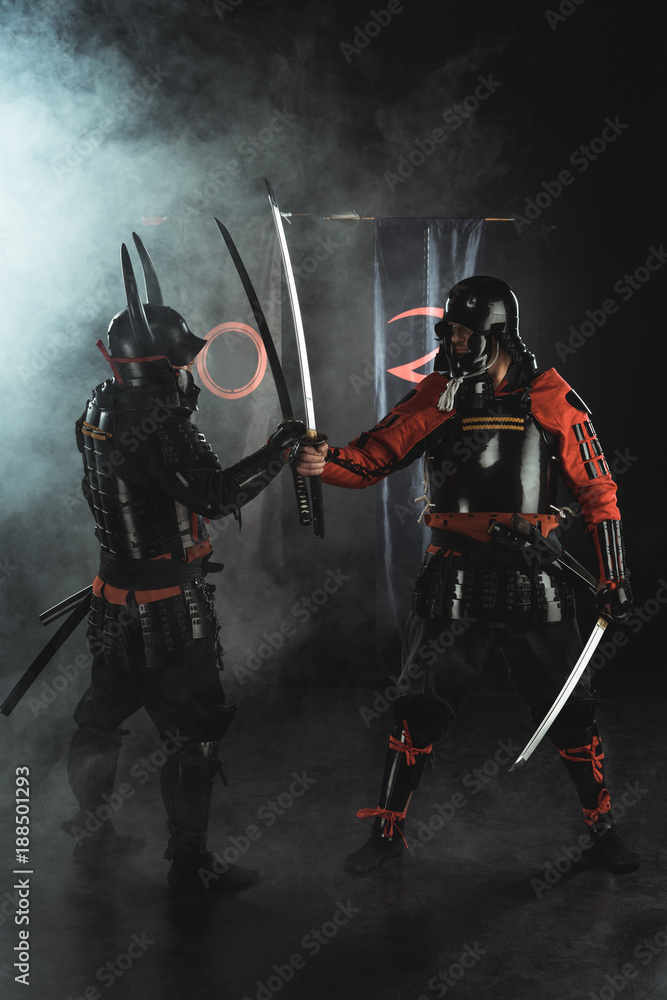 Fototapeta premium samurai in traditional greeting each other on black
