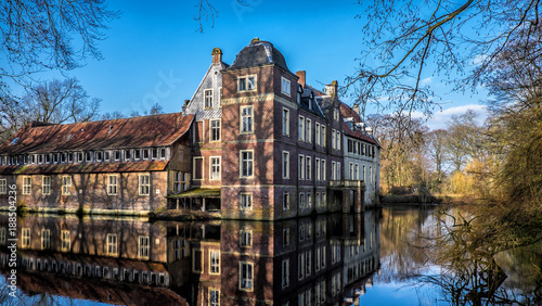 Senden, Coesfeld, Musterland December 2017 - Watercastle Wasserschloss Schloss Senden during sunny day in Winter photo