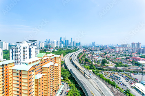 aerial view of modern residential buildings and elevated road © zhu difeng
