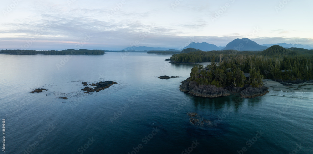 Aerial panoramic landscape view of the rocky Pacific Ocean Coast during a vibrant summer morning. Taken in Ucluelet, Vancouver Island, British Columbia, Canada.
