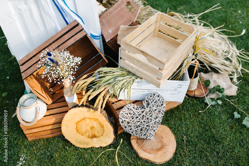 Closeup shot of the rustiс wedding decoration elements  at daylight photo