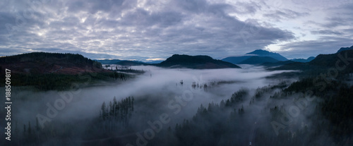 Aerial Drone Panoramic View of the Beautiful Canadian Landscape during a cloudy sunset. Taken in Vancouver Island, British Columbia, Canada. © edb3_16