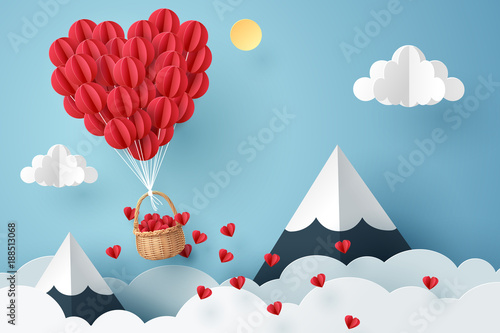 Paper art of heart balloon flying and scattering little heart in the sky, origami and valentine's day concept