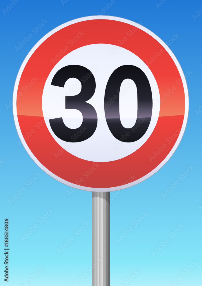 Panneau de limitation de vitesse à 30 sur ciel bleu Panneau de limitation de vitesse à 30 sur ciel bleu