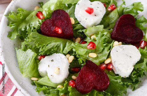 Fresh salad with goat cheese, roasted beets and lettuce
