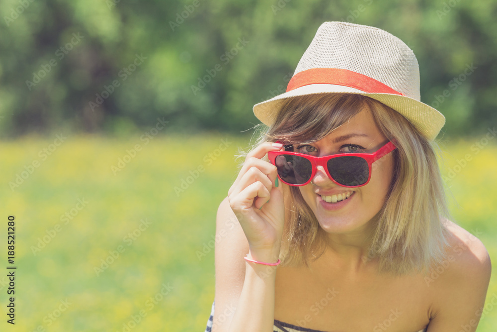 Cute girl enjoying in a nice flowerly field. Cute girl enjoying in a nice flowerly field.