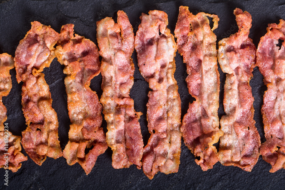 Sliced fried bacon