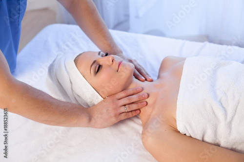 girl masseur doing massage in spa health