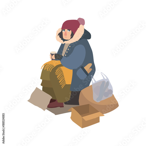 Poor homeless woman dressed in ragged outerwear sitting on street beside pile of garbage, holding paper cup and begging for money. Cartoon character isolated on white background. Vector illustration.