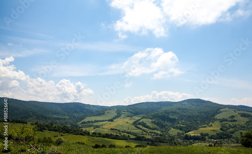 Fototapeta Naklejka Na Ścianę i Meble -  Fantastic view of the alpine valley with blue sky