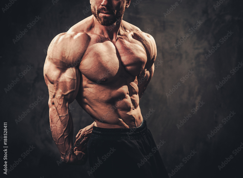 Photo & Art Print Man showing his muscular body