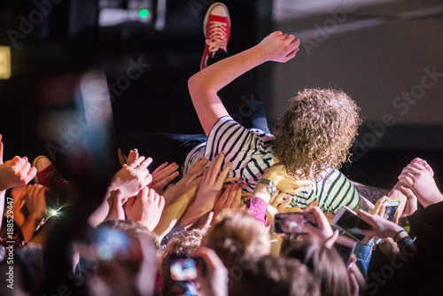 Crowdsurfer at music festival