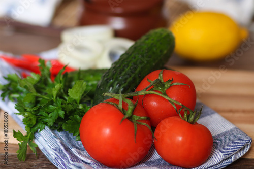 Fresh vegetables and herbs. Tomatoes, cucumbers, pepper