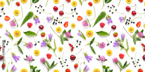 Seamless pattern from plants, wild flowers and berries, isolated on white background, flat lay, top view. The concept of summer, spring, Mother's Day, March 8. 